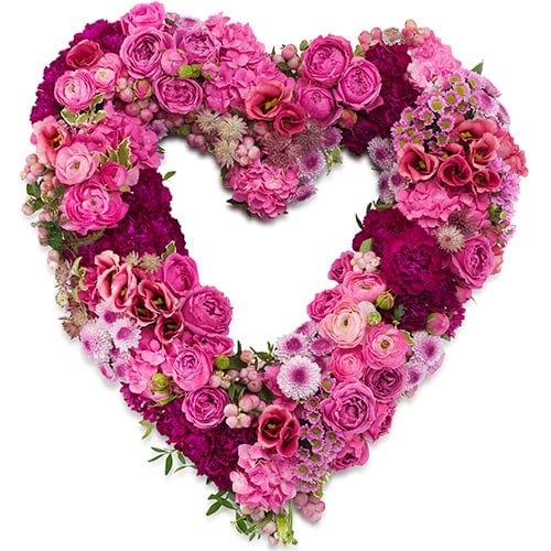 Open rouwhart met roze bloemen